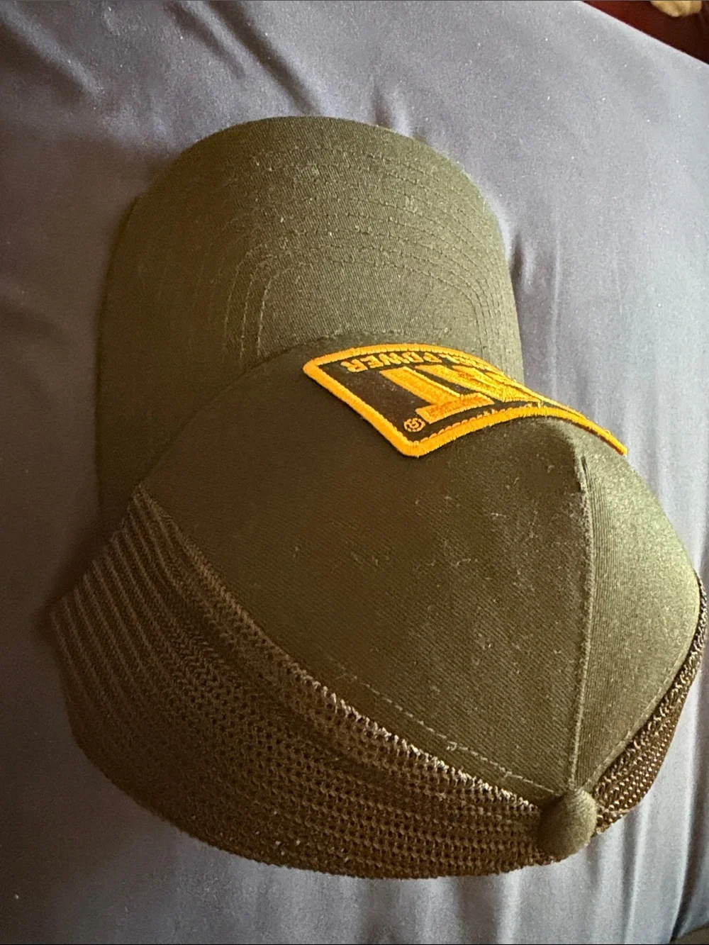 Caterpillar Black Trucker Hat with Yellow CAT Patch